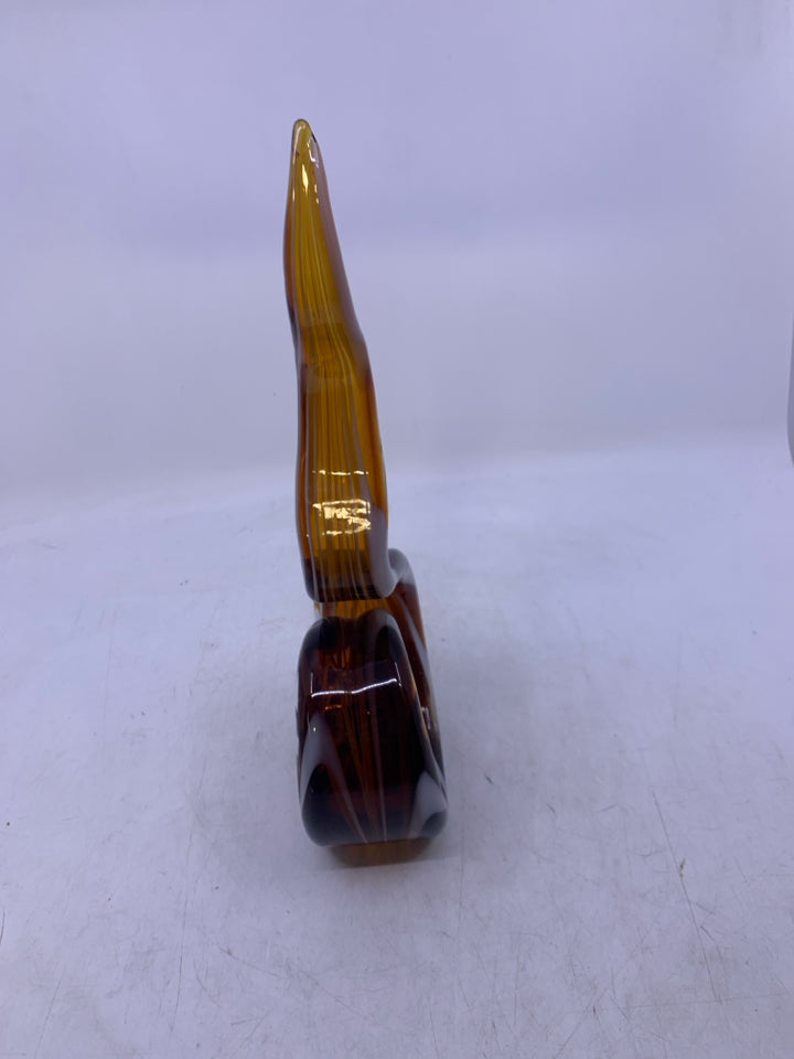 BROWN BLOWN GLASS SWIRL STANDING ABSTRACT PIECE W/ WHITE LINES.