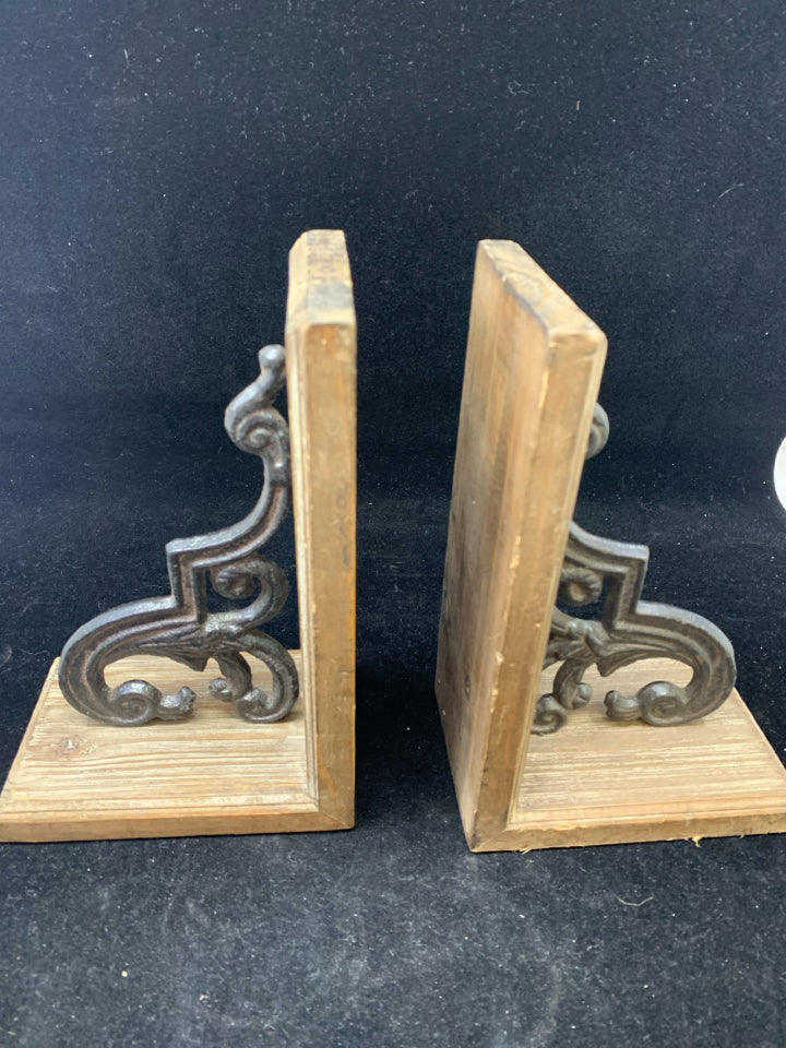 2 DARK WOOD BOOKENDS W/ METAL SCROLL.