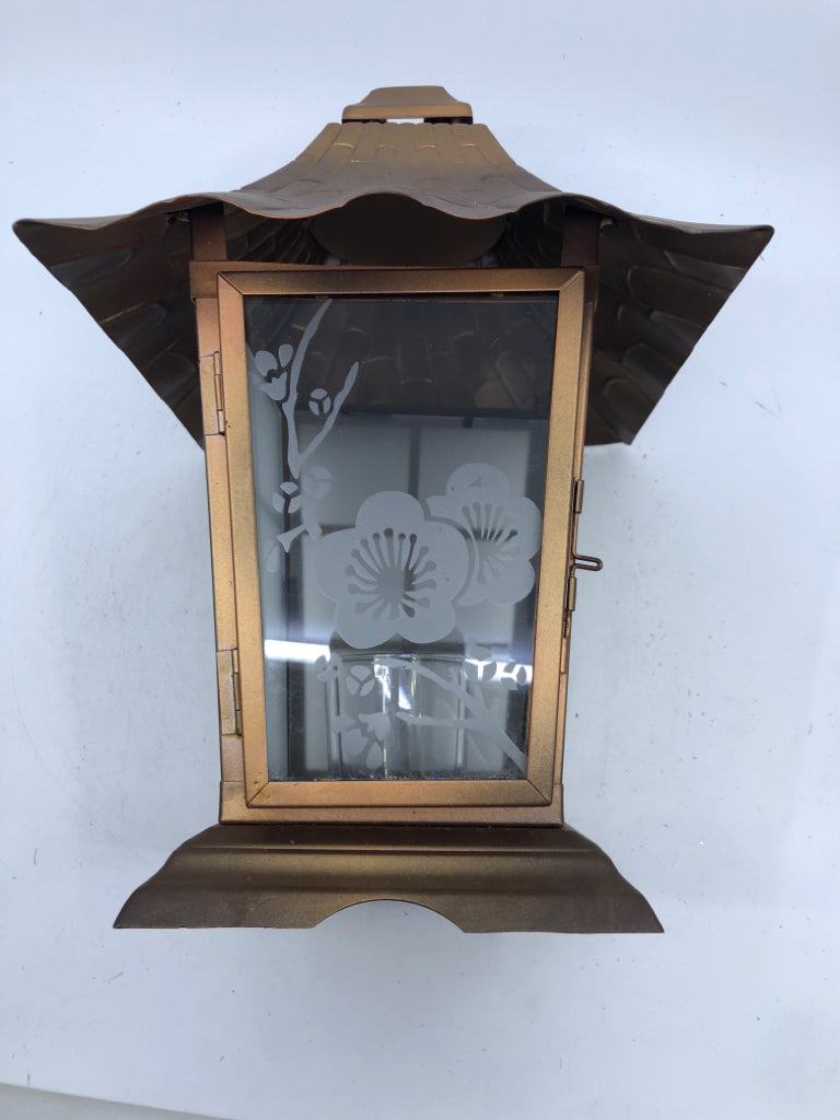 BRONZE METAL LANTERN WITH EMBOSSED FLOWER DESIGN ON GLASS AND FROSTED GLASS PANE