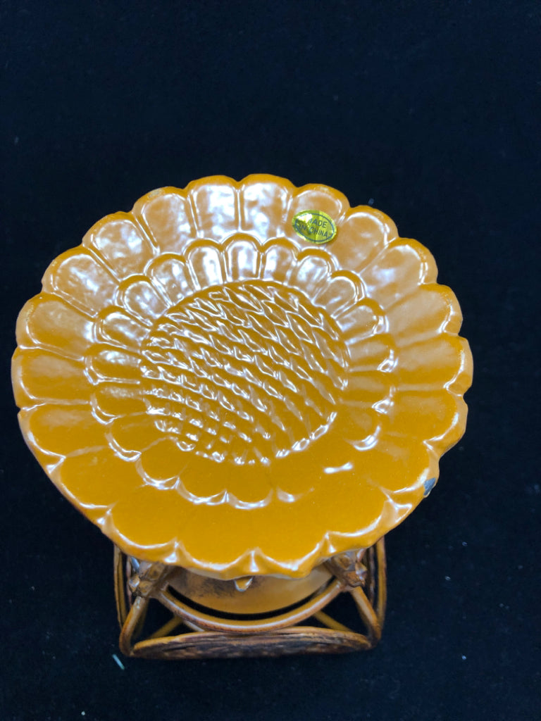 RUST COLORED METAL ORNATE PILLAR CANDLE HOLDER.