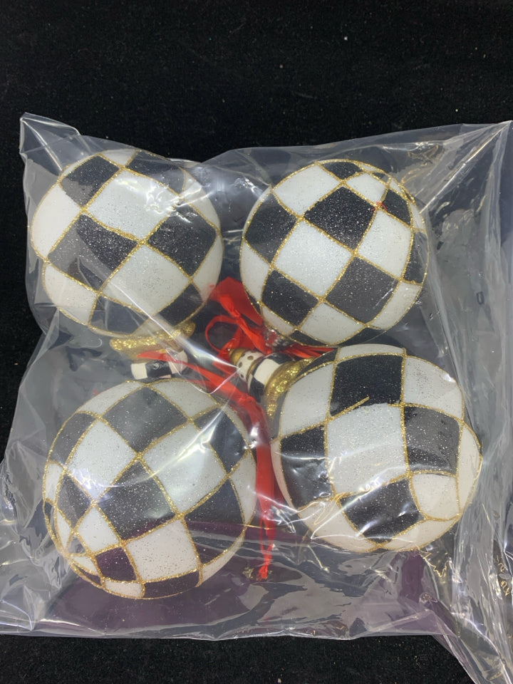 4 BLACK/WHITE CHECKERED GLASS ORNAMENTS.