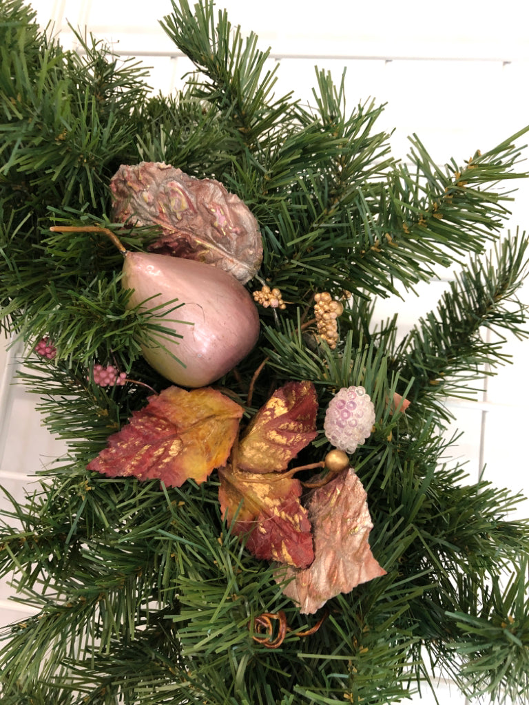 EVERGREEN WREATH W/PINK LEAVES.