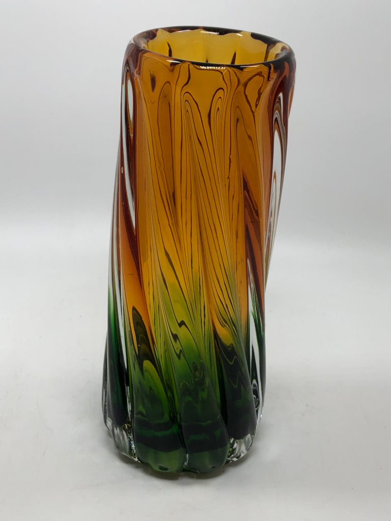 GREEN/YELLOW EASTERN GLASS SWIRL VASE.