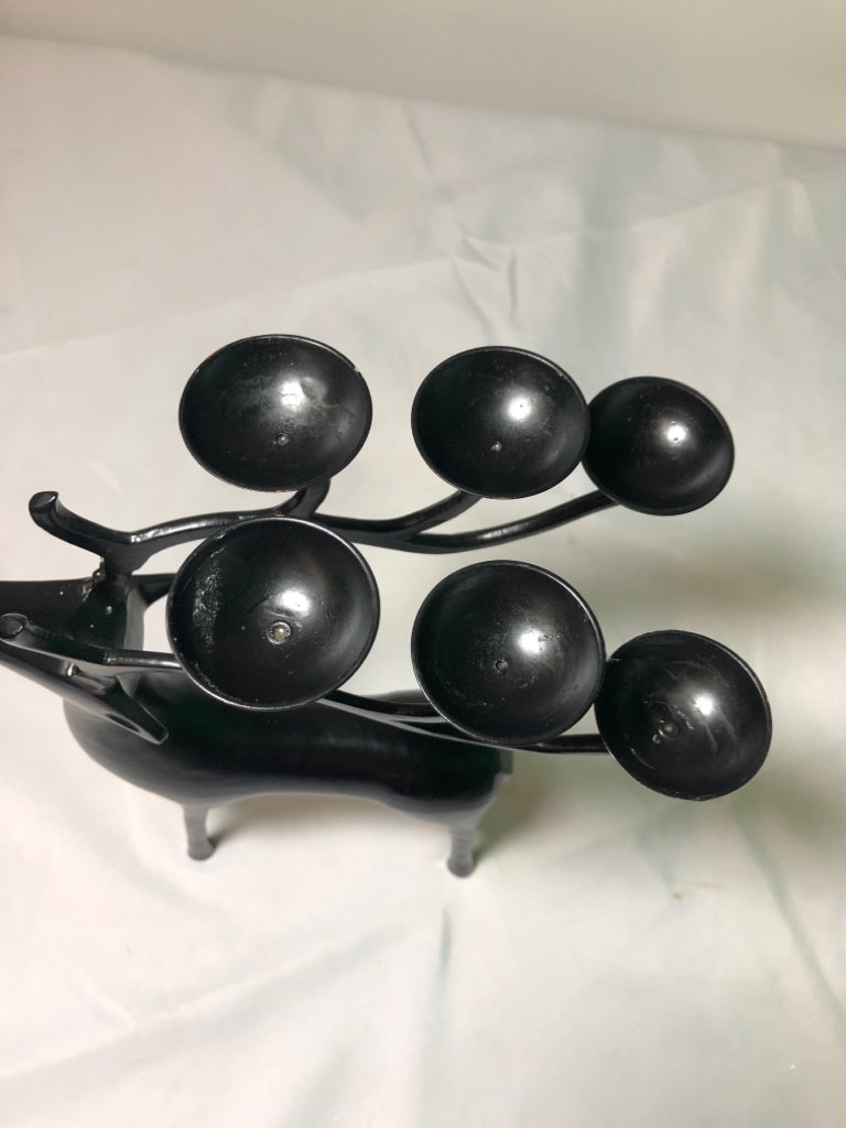BLACK METAL DEER W/ 6 GREEN CIRCLE CANDLES ON ANTLERS.
