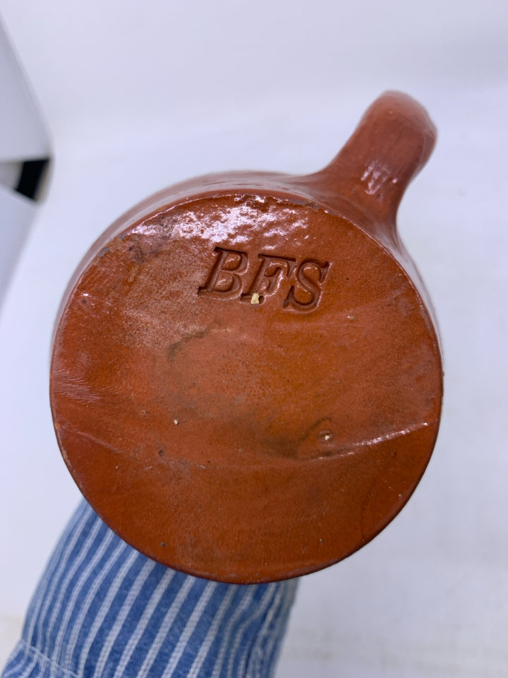 SMALL POTTERY PITCHER.