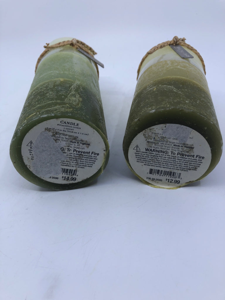 2 GREEN PILLAR CANDLE.