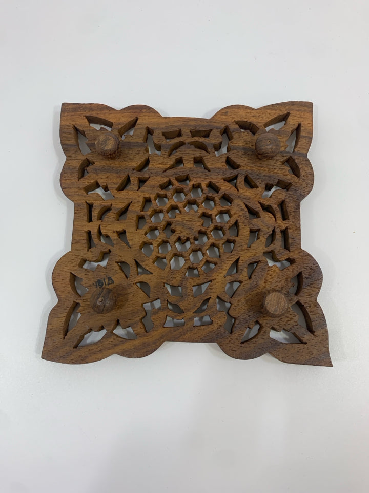 CARVED WOOD LEAF TRIVET.