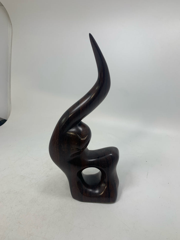 ABSTRACT DARK WOOD CARVED FIGURE DONUT HOLE SIGNED BOTTOM.