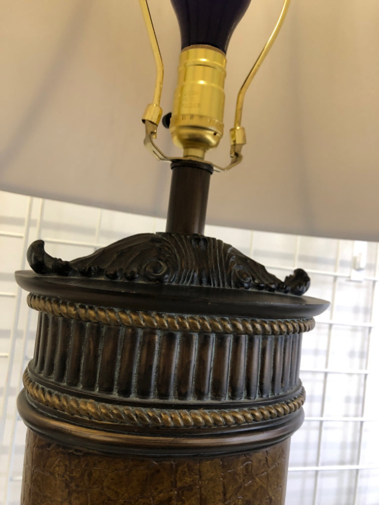 ORNATE SNAKE SKIN LAMP W/CREAM SHADE.