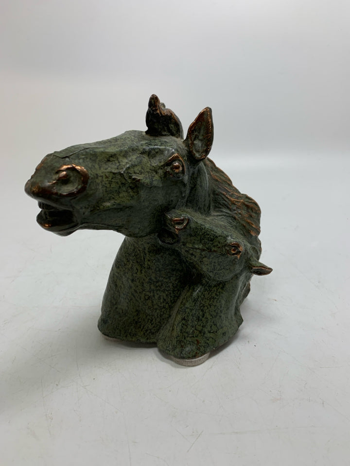 GREEN METAL HEAVY HORSE HEAD W/ BABY FIGURINE.