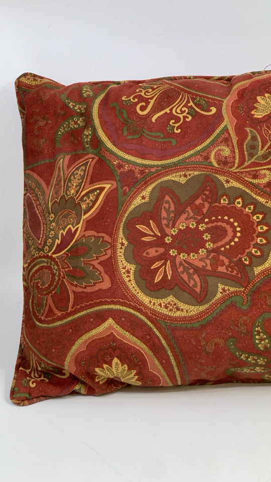 RED RECTANGLE ACCENT PILLOW W/FLORAL DESIGN.