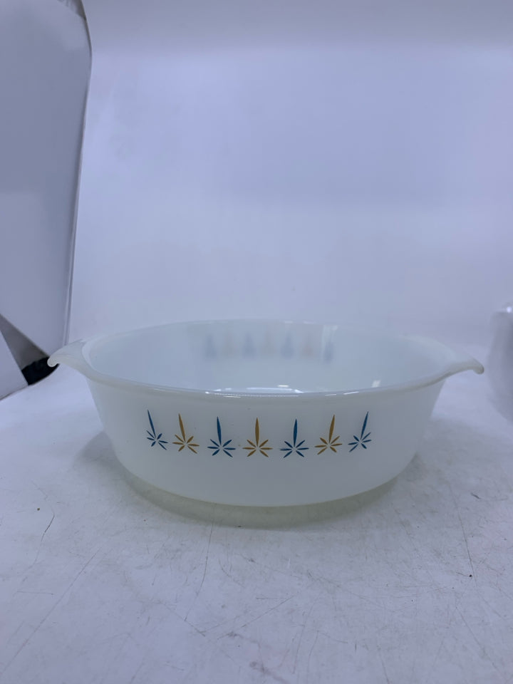 VTG WHITE CIRCLE CASSEROLE DISH W/ BLUE GOLD STAR PATTERN.