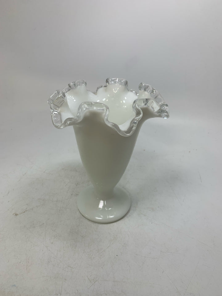 MILK GLASS FOOTED VASE W/ CLEAR RUFFLED EDGE.