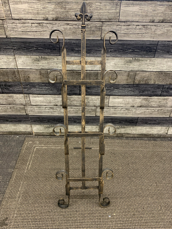 STANDING METAL MAGAZINE RACK.