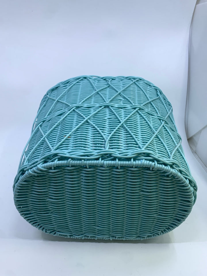 LT BLUE WICKER WASTEBASKET.