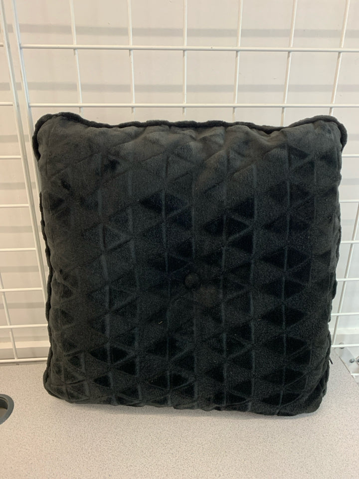 BLACK FUZZY PILLOW.