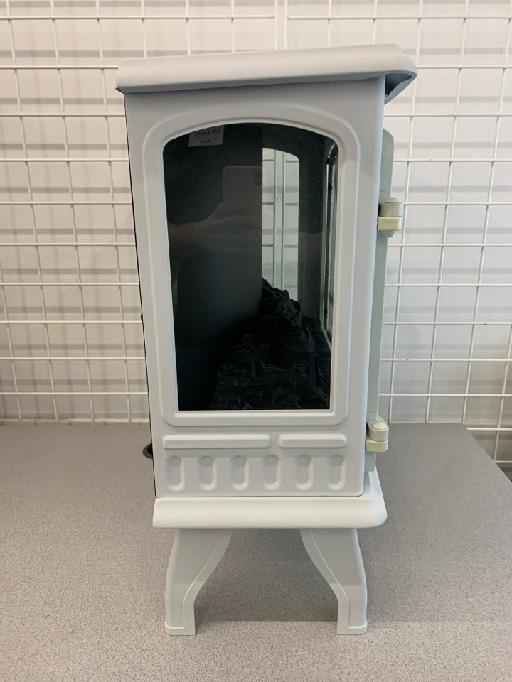 LIGHT BLUE ELECTRIC STOVE FIREPLACE.