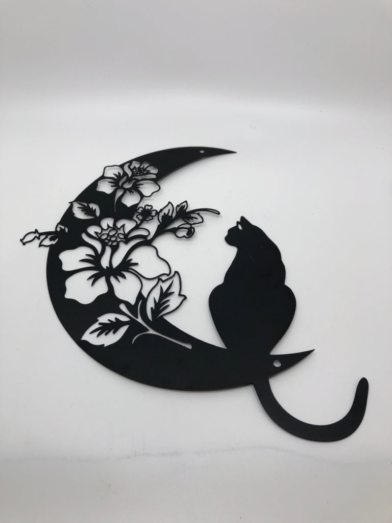 CAT AND FLOWERS ON MOON SILHOUETTE.
