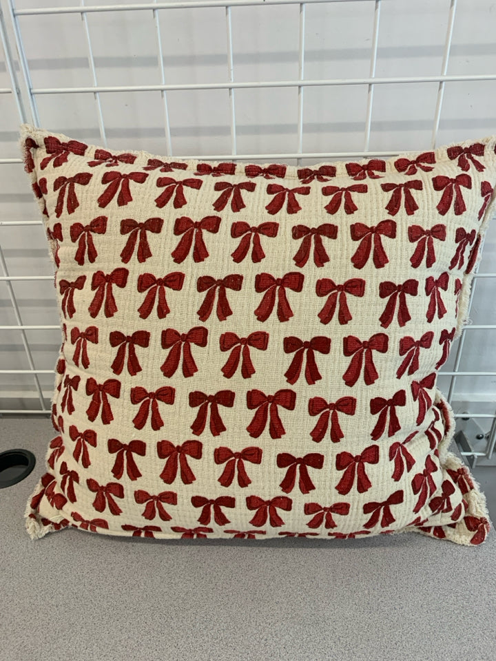 RED BOW PILLOW.
