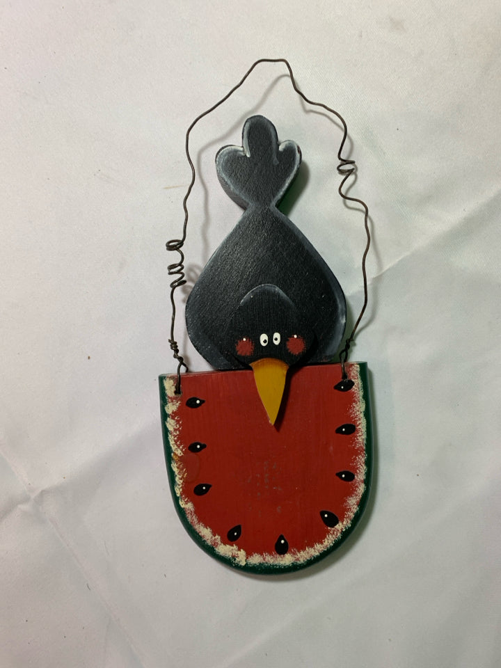 CROW EATING WATERMELON WALL HANGING.