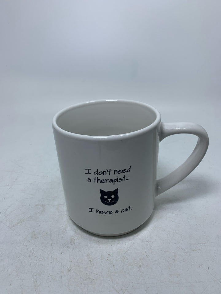 I DONT NEED A THERAPIST I HABE A CAT MUG.