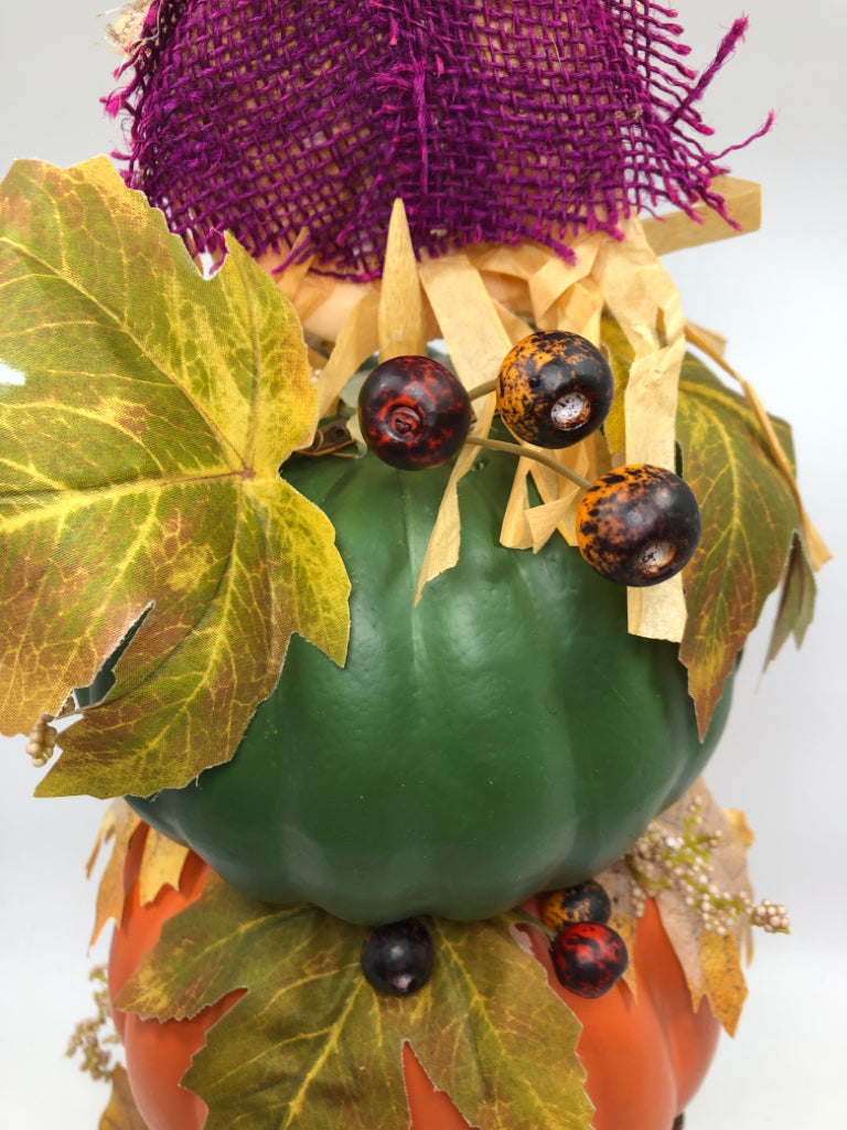 STACKED PUMPKINS W/FALL THEMED PIP, LEAVES AND SCARECROW.