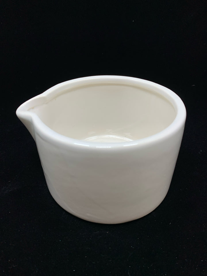 WHITE CERAMIC MEASURING PITCHER.