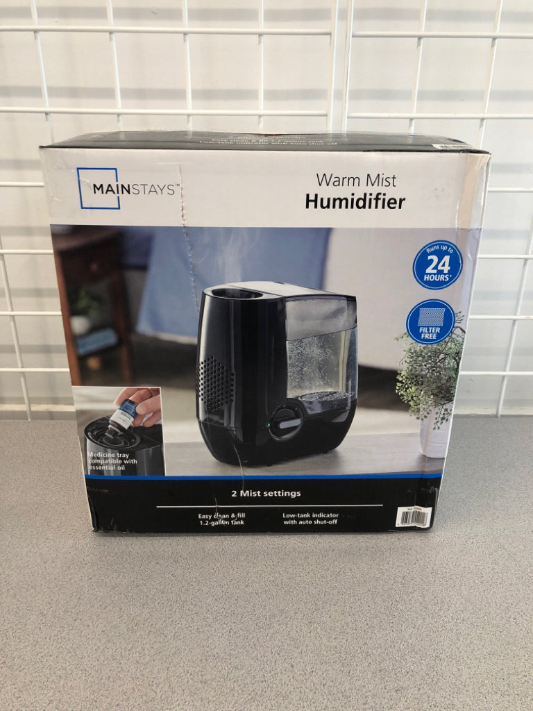 NIB WARM MIST HUMIDIFIER.