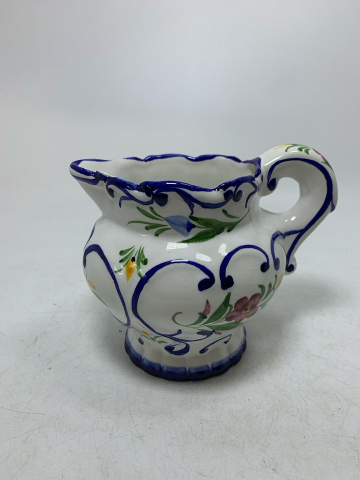 BLUE EDGES W/ FLORAL PITCHER MADE IN PORTUGAL.