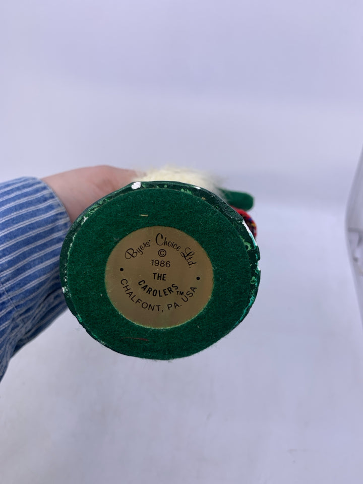 1986 BYERS' CHOICE GIRL CAROLER WITH MUFF.