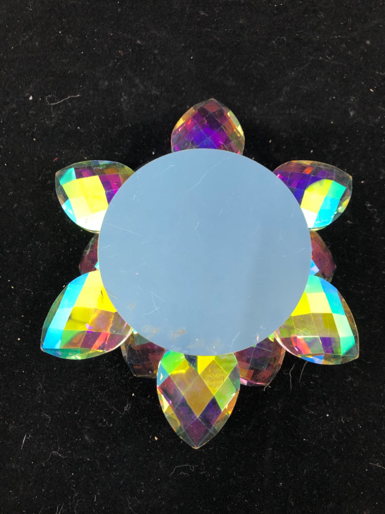 IRIDESCENT FLOWER GLASS CANDLE HOLDER.