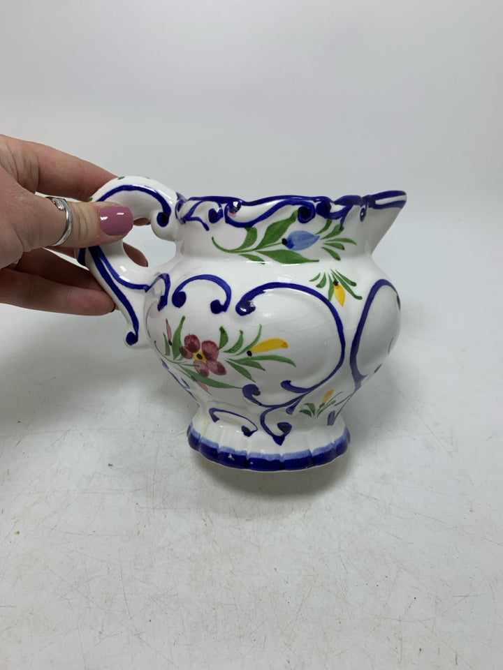 BLUE EDGES W/ FLORAL PITCHER MADE IN PORTUGAL.
