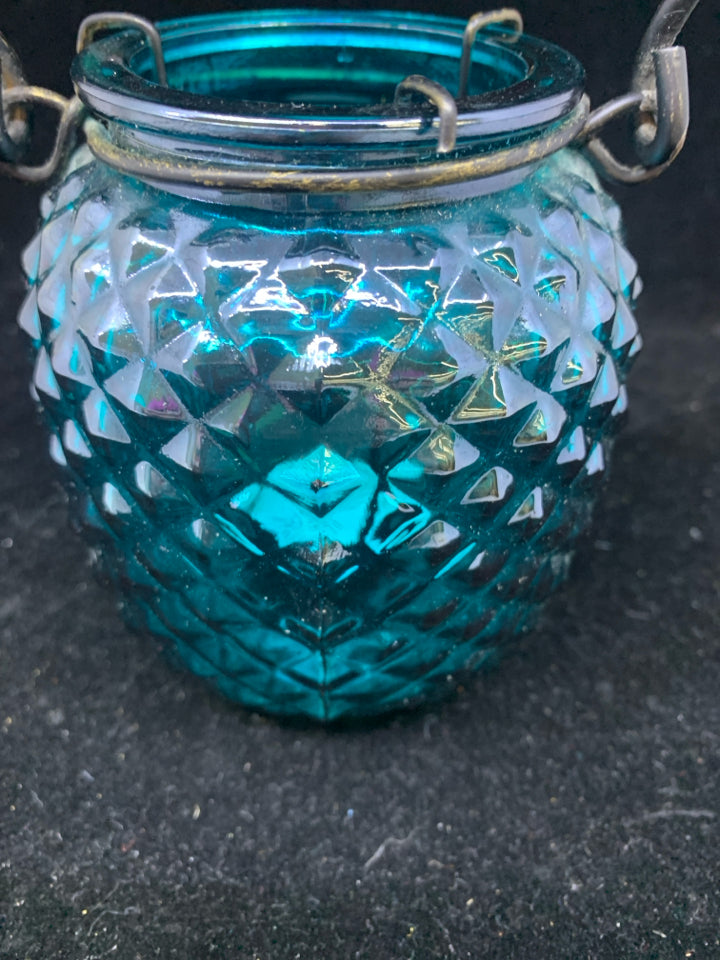 TEAL GLASS LANTERN TEA LIGHT HOLDER.