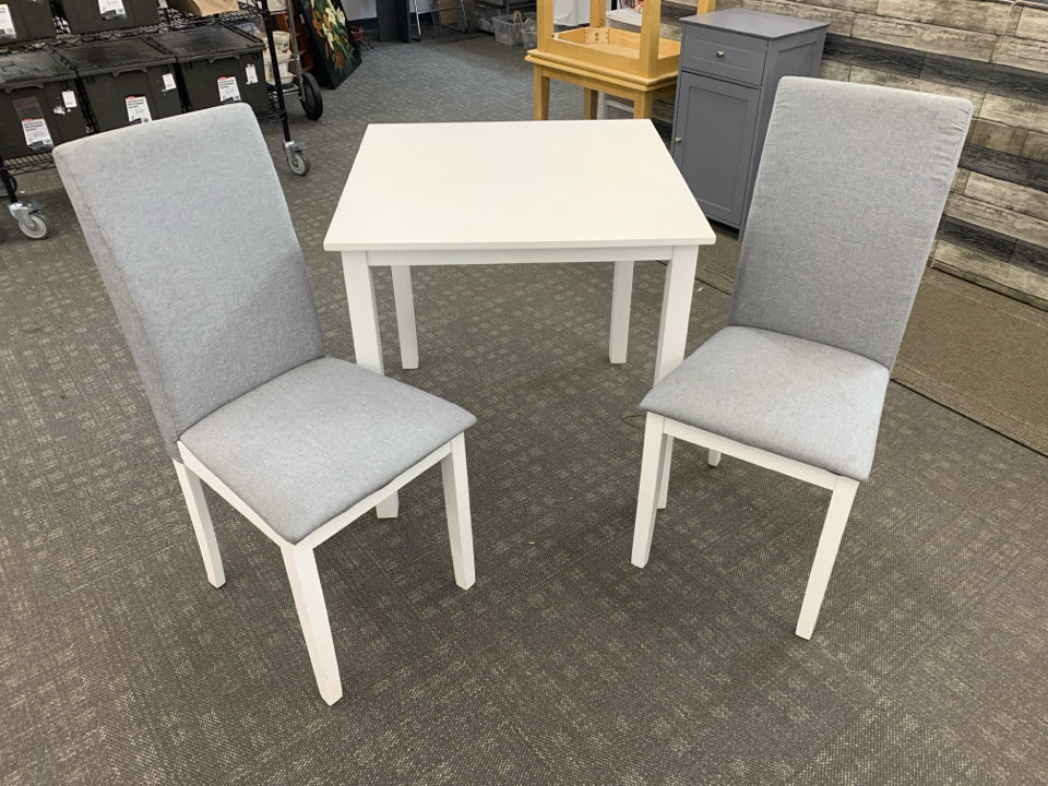 WHITE TABLE W/2 GRAY UPHOLSTERED CHAIRS.