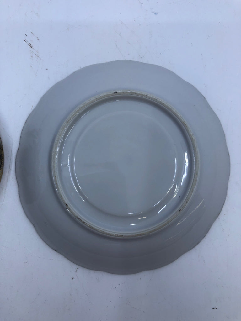 GOLD/GREY IRIDESCENT FLORAL TEACUP AND SAUCER.