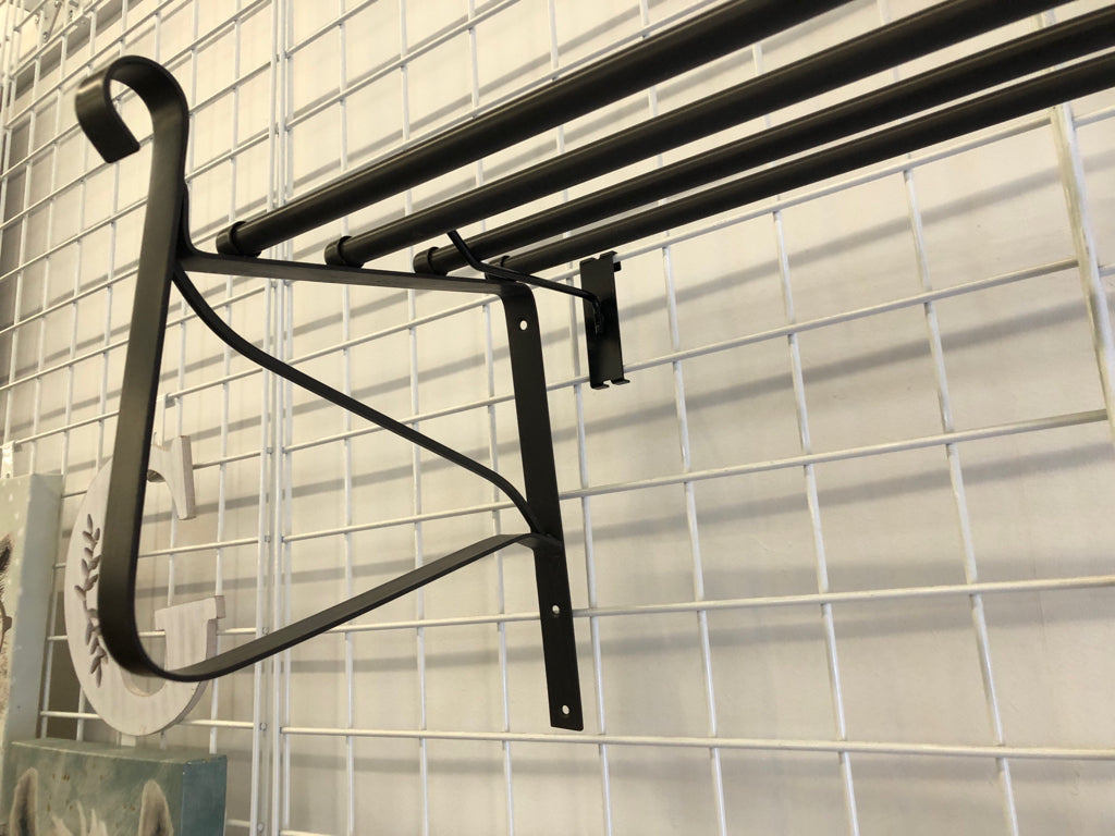 LARGE GREY SCROLL METAL WALL SHELF.
