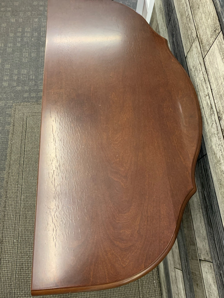 MAROON HALF MOON TABLE W 1 DRAWER.