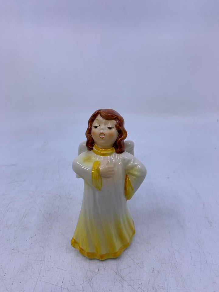 ANGEL IN YELLOW DRESS RED HAIR.