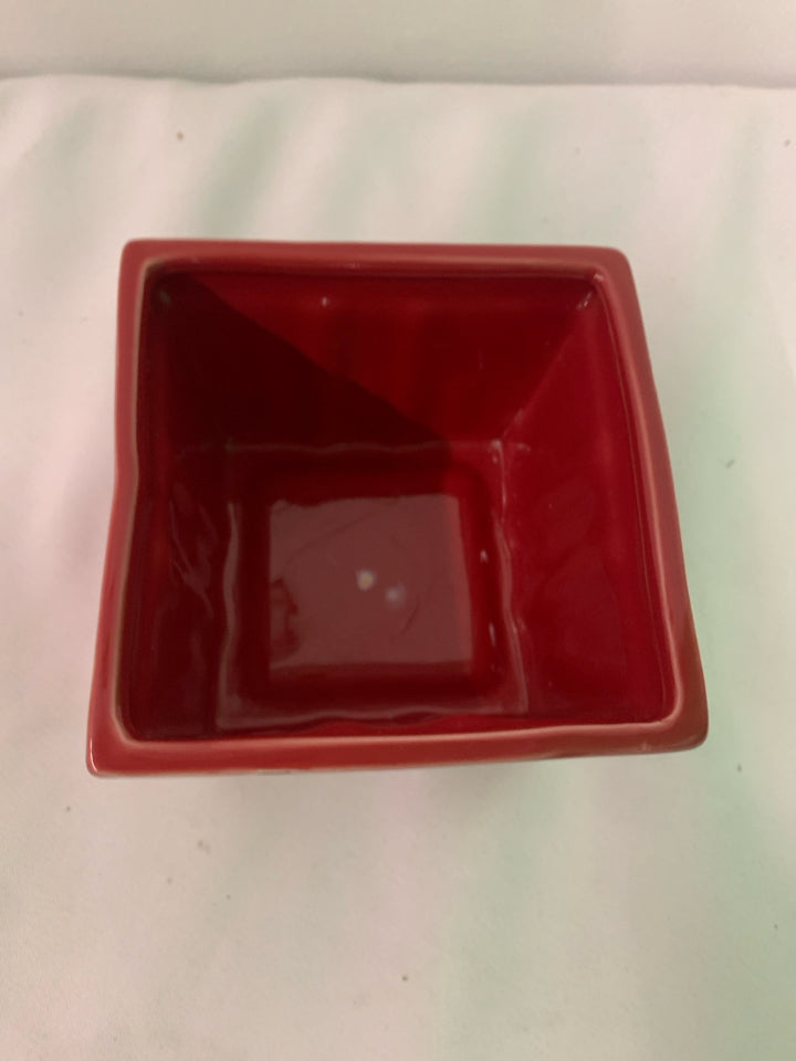 RED CERAMIC FRUIT BASKET.