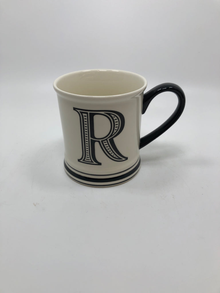 R COFFEE MUG W/BLACK HANDLE.
