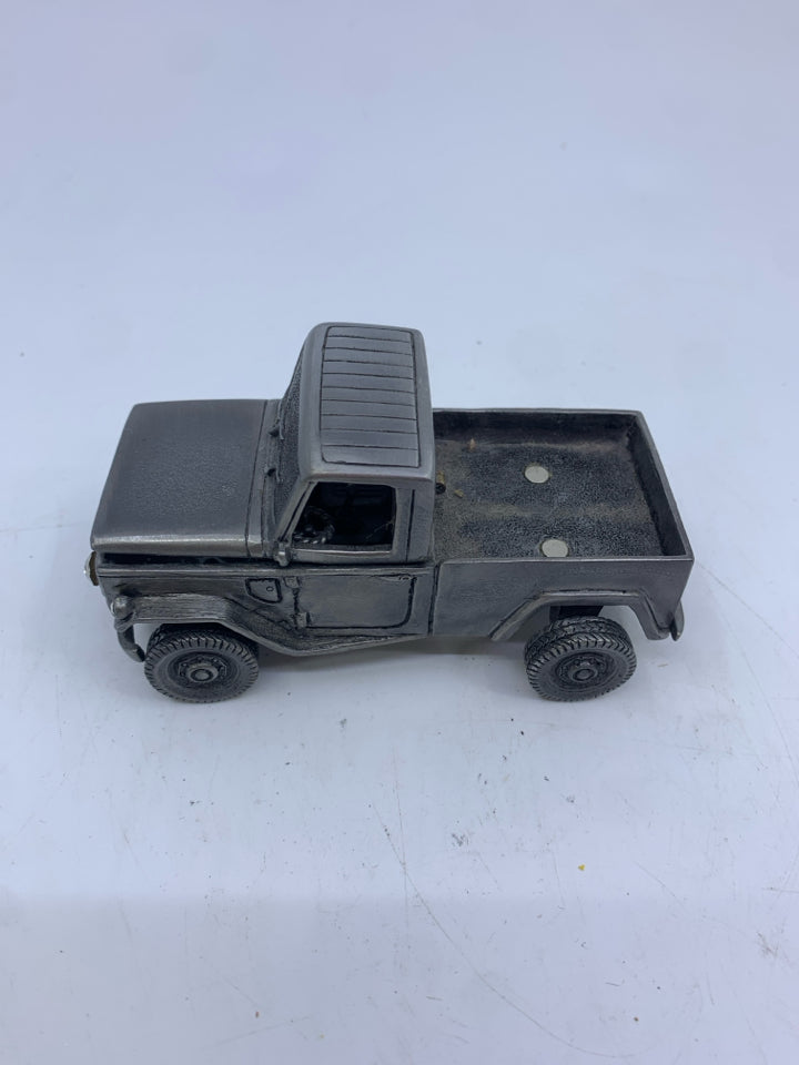 HEAVY METAL MIDDLE EASTERN DECORATIVE TRUCK W JEWELS AND MAGNETIC CAMELS.