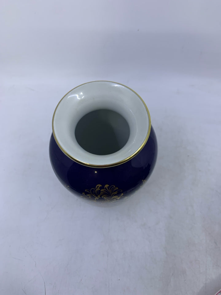 COBALT BLUE VASE W/ GOLD DETAILED FLOWERS.