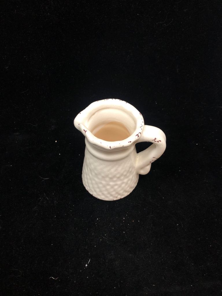 SMALL DISTRESSED WHITE CERAMIC PITCHER.