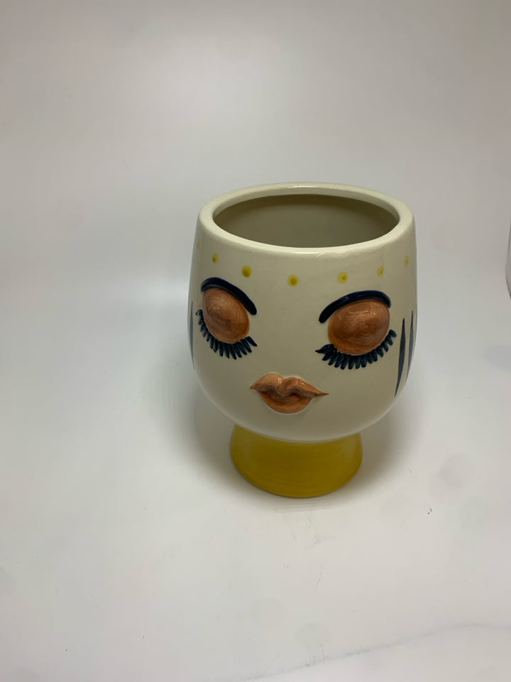 YELLOW DETAILED FACE PLANTER.