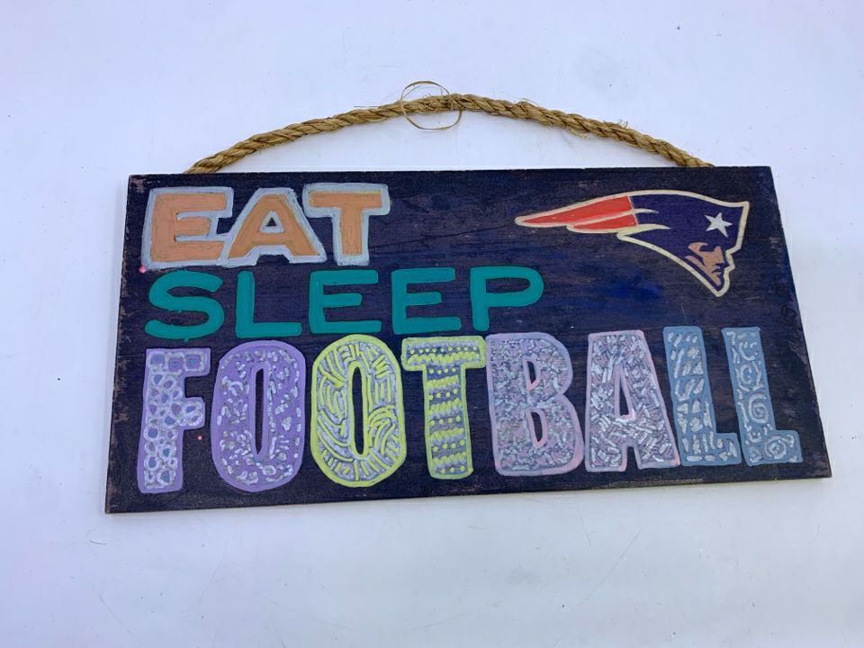 EAT SLEEP FOOTBALL SIGN.