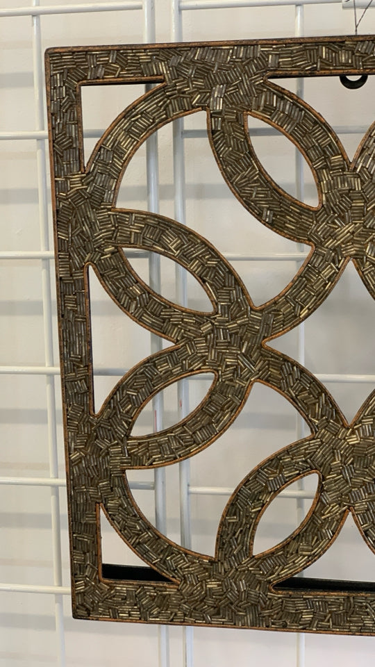 BEADED SCROLL WALL HANGING.