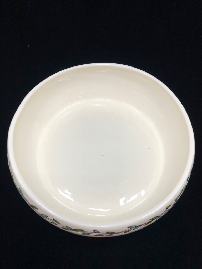 CERAMIC BOWL W/BLUE GREEN LEAF PAINTED RIM.