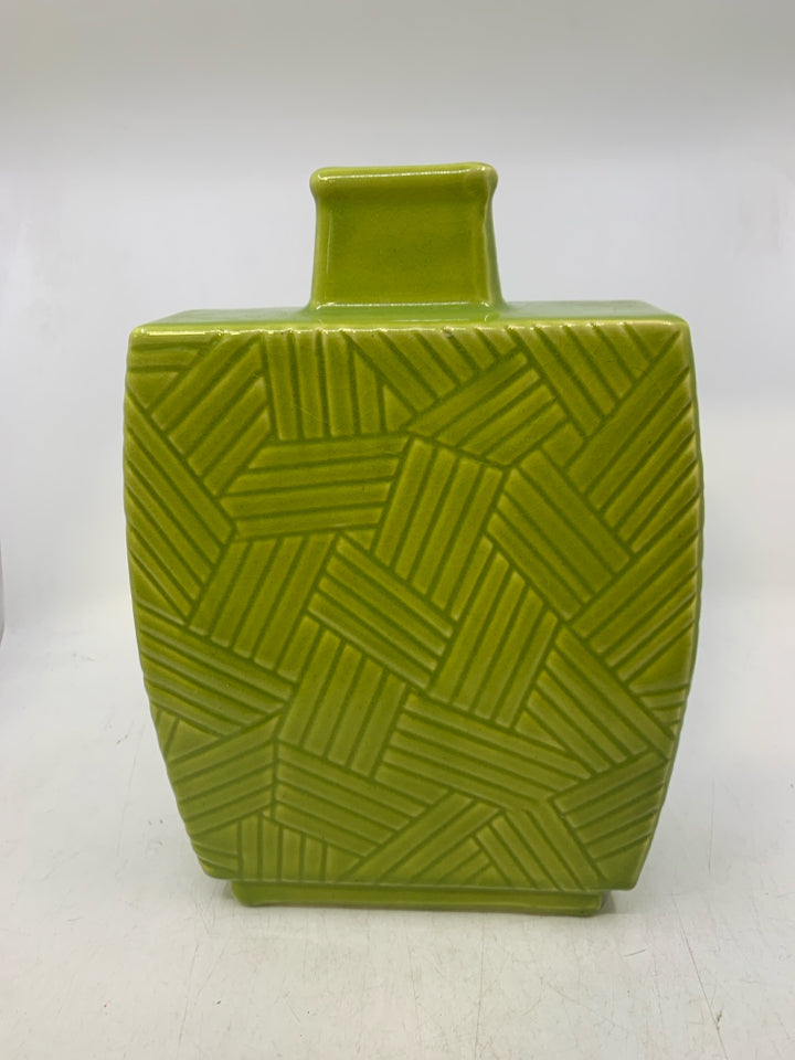 CERAMIC VASE W/ EMBOSSED LINES.