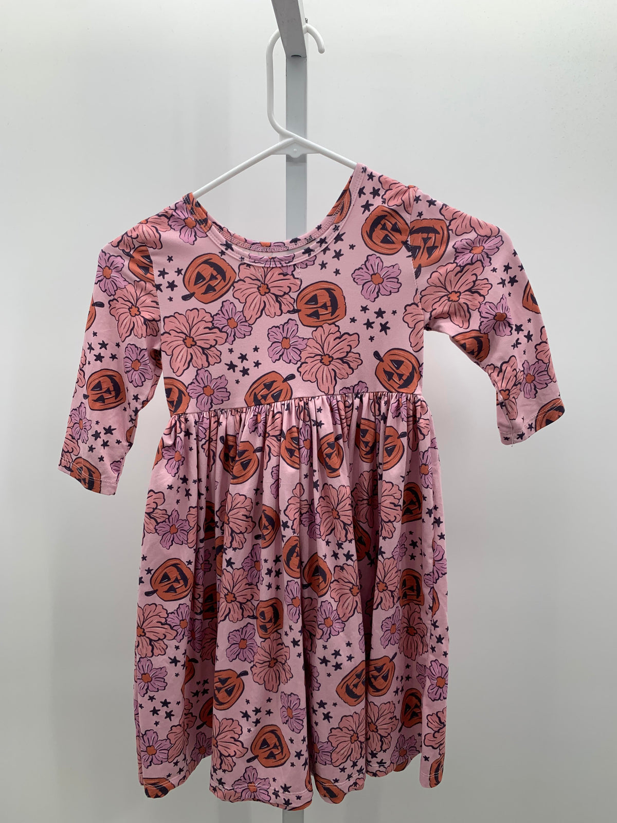 LONG SLV DRESS JACK O'LANTERNS FLOWERS.
