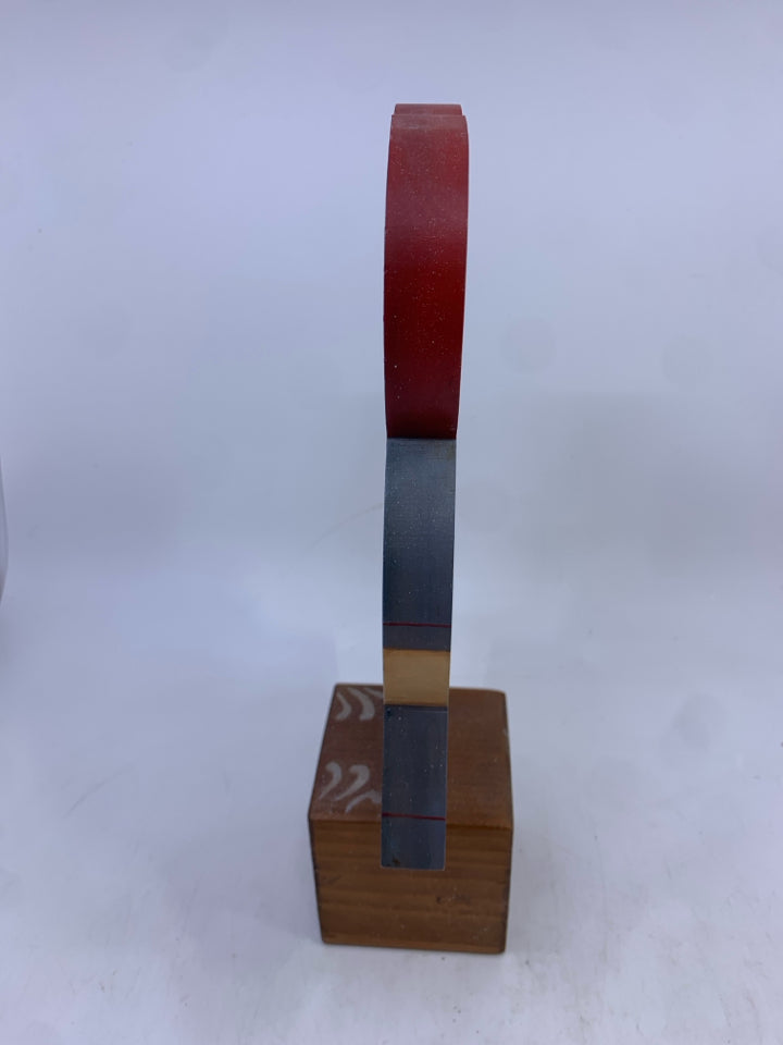 WOOD GIRL IN BLUE DRESS ON "JOY" BLOCK.